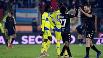 Venezia's Italian defender Marco Modolo (R) celebrates his team draw with his teammate Venezia's US midfielder Gianluca Busio (2R) after the Italian Serie A football match between Venezia and Juventus at the Pier Luigi Penzo Stadium in Venice, on December 11, 2021. (Photo by Miguel MEDINA / AFP) (Photo by MIGUEL MEDINA/AFP via Getty Images)