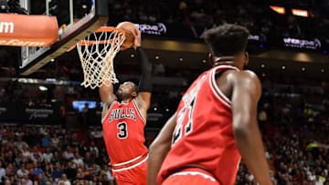 Nov 10, 2016; Miami, FL, USA; Chicago Bulls guard Dwyane Wade (3) dunks the ball as Bulls forward Jimmy Butler (R) looks on against the Miami Heat during the first half at American Airlines Arena. Mandatory Credit: Steve Mitchell-USA TODAY Sports