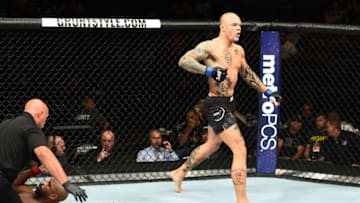 CHICAGO, ILLINOIS - JUNE 09: (R-L) Anthony Smith celebrates after defeating Rashad Evans in their light heavyweight fight during the UFC 225 event at the United Center on June 9, 2018 in Chicago, Illinois. (Photo by Josh Hedges/Zuffa LLC/Zuffa LLC via Getty Images)
