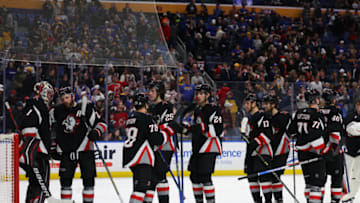 Mar 24, 2023; Buffalo, New York, USA; The Buffalo Sabres celebrate a win over the New Jersey Devils at KeyBank Center. Mandatory Credit: Timothy T. Ludwig-USA TODAY Sports