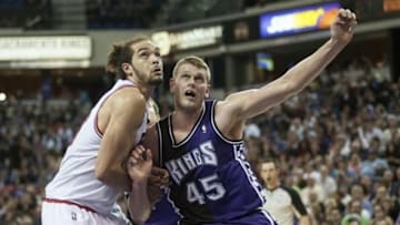 Mar 13, 2013; Sacramento, CA, USA; Chicago Bulls center Joakim Noah (13) and Sacramento Kings center Cole Aldrich (45) fight for position under the basket during the second quarter at Power Balance Pavilion. The Sacramento Kings defeated the Chicago Bulls 121-79. Mandatory Credit: Ed Szczepanski-USA TODAY Sports