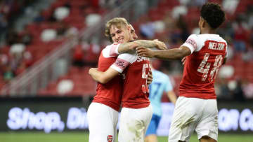 SINGAPORE - JULY 26: Emile Smith Rowe of Arsenal celebrate with Hector Bellerin after scoring the equaliser during the International Champions Cup 2018 match between Atletico Madrid and Arsenal at the National Stadium on July 26, 2018 in Singapore. (Photo by Suhaimi Abdullah/Getty Images for ICC)