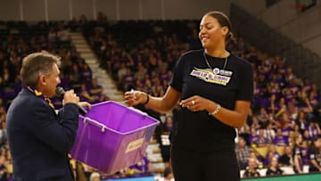 MELBOURNE, AUSTRALIA - OCTOBER 13: Liz Cambage (R) draws a prize at half time during the round one WNBL match between the Melbourne Boomers and the Bendigo Spirit at the State Basketball Centre on October 13, 2018 in Melbourne, Australia. (Photo by Kelly Defina/Getty Images)