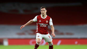 LONDON, ENGLAND - JANUARY 18: Cedric Soares of Arsenal runs with the ball during the Premier League match between Arsenal and Newcastle United at Emirates Stadium on January 18, 2021 in London, England. Sporting stadiums around England remain under strict restrictions due to the Coronavirus Pandemic as Government social distancing laws prohibit fans inside venues resulting in games being played behind closed doors. (Photo by Adam Davy - Pool/Getty Images)