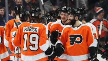 PHILADELPHIA, PA - MARCH 27: Nolan Patrick #19, Radko Gudas #3, and James van Riemsdyk #25 of the Philadelphia Flyers celebrate with their teammates after defeating the Toronto Maple Leafs 5-4 in a shootout on March 27, 2019 at the Wells Fargo Center in Philadelphia, Pennsylvania. (Photo by Len Redkoles/NHLI via Getty Images)