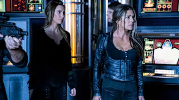 The 100 -- "What You Take With You" -- Image Number: HU609b_0677b.jpg -- Pictured (L-R): Jessica Harmon as Niylah and Paige Turco as Abby -- Photo: Jack Rowand/The CW -- © 2019 The CW Network, LLC. All rights reserved.