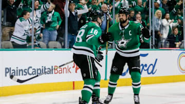 DALLAS, TX - OCTOBER 23: Dallas Stars center Tyler Pitlick (18) celebrates scoring a goal with left wing Jamie Benn (14) during the game between the Dallas Stars and the Los Angeles Kings on October 23, 2018 at the American Airlines Center in Dallas, Texas. Dallas defeats LA 4-2. (Photo by Matthew Pearce/Icon Sportswire via Getty Images)