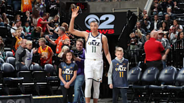 SALT LAKE CITY, UT - OCTOBER 04: Dante Exum #11 of the Utah Jazz walks on to the court with fans during the meet the team event at vivint.SmartHome Arena on October 04, 2019 in Salt Lake City, Utah. NOTE TO USER: User expressly acknowledges and agrees that, by downloading and or using this Photograph, User is consenting to the terms and conditions of the Getty Images License Agreement. Mandatory Copyright Notice: Copyright 2019 NBAE (Photo by Melissa Majchrzak/NBAE via Getty Images)