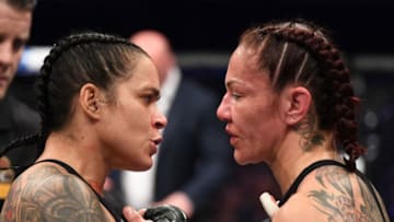INGLEWOOD, CA - DECEMBER 29: (L-R) Amanda Nunes of Brazil and Cris Cyborg of Brazil speak after the conclusion of their women's featherweight bout during the UFC 232 event inside The Forum on December 29, 2018 in Inglewood, California. (Photo by Josh Hedges/Zuffa LLC/Zuffa LLC via Getty Images)