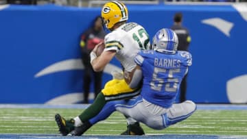 Nov 6, 2022; Detroit, Michigan, USA; Detroit Lions linebacker Derrick Barnes (55) sacks Green Bay Packers quarterback Aaron Rodgers (12) during the first half at Ford Field. Mandatory Credit: Junfu Han-USA TODAY Sports