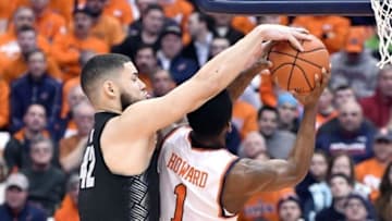 Dec 17, 2016; Syracuse, NY, USA; Georgetown Hoyas center Bradley Hayes (42) blocks the shot of Syracuse Orange guard Frank Howard (1) during the first half at the Carrier Dome. Mandatory Credit: Mark Konezny-USA TODAY Sports