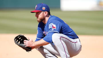 Mar 8, 2016; Mesa, AZ, USA; Texas Rangers first baseman Ike Davis (20) in the first inning during a spring training against the Oakland Athletics at HoHoKam Stadium. Mandatory Credit: Rick Scuteri-USA TODAY Sports