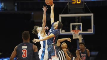 The St. John's basketball team tips-off against Creighton at Madison Square Garden. (Photo by Porter Binks).