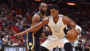 Dec 14, 2016; Miami, FL, USA; Miami Heat center Hassan Whiteside (21) controls the ball around Indiana Pacers center Al Jefferson (7) during the second half at American Airlines Arena. The Miami Heat defeat Indiana Pacers 95-89. Mandatory Credit: Jasen Vinlove-USA TODAY Sports