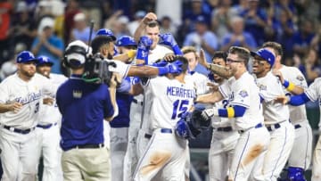 KANSAS CITY, MO - SEPTEMBER 1: Whit Merrifield #15 of the Kansas City Royals is mobbed while crossing home plate after hitting a walk-off home run against the Baltimore Orioles during the ninth inning at Kauffman Stadium on September 1, 2018 in Kansas City, Missouri. (Photo by Brian Davidson/Getty Images)