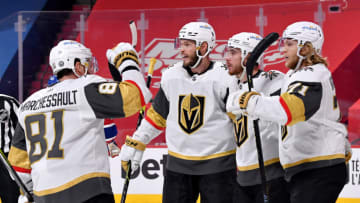 MONTREAL, QUEBEC - JUNE 24: Reilly Smith #19 of the Vegas Golden Knights celebrates with his teammates after scoring a goal against Carey Price #31 of the Montreal Canadiens during the first period in Game Six of the Stanley Cup Semifinals of the 2021 Stanley Cup Playoffs at Bell Centre on June 24, 2021 in Montreal, Quebec. (Photo by Minas Panagiotakis/Getty Images)