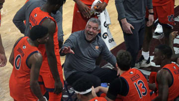 Auburn basketballMar 2, 2022; Starkville, Mississippi, USA; Auburn Tigers head coach Bruce Pearl talks with his team during a timeout during the first half again the Mississippi State Bulldogs at Humphrey Coliseum. Mandatory Credit: Petre Thomas-USA TODAY Sports