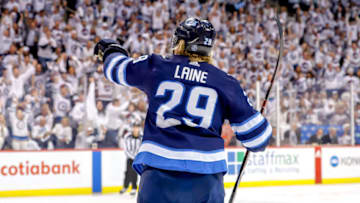 WINNIPEG, MB - APRIL 12: Patrik Laine #29 of the Winnipeg Jets celebrates his second period goal against the St. Louis Blues in Game Two of the Western Conference First Round during the 2019 NHL Stanley Cup Playoffs at the Bell MTS Place on April 12, 2019 in Winnipeg, Manitoba, Canada. (Photo by Darcy Finley/NHLI via Getty Images)