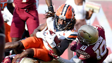 Oct 2, 2021; Tallahassee, Florida, USA; Syracuse Orange wide receiver Courtney Jackson (85) is tackled by Florida State Seminoles defensive back Jammie Robinson (10) during the second half at Doak S. Campbell Stadium. Mandatory Credit: Melina Myers-USA TODAY Sports