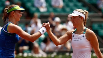 PARIS, FRANCE - MAY 28: A victorius Ekaterina Makarova of Russia (L) shakes hands with Angelique Kerber of Germany after the ladies singles first round match on day one of the 2017 French Open at Roland Garros on May 28, 2017 in Paris, France. (Photo by Adam Pretty/Getty Images)