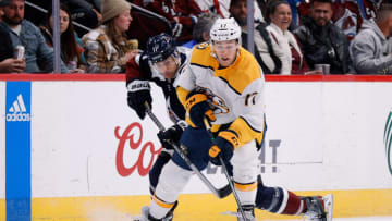 Nov 10, 2022; Denver, Colorado, USA; Nashville Predators center Mark Jankowski (17) controls the puck under pressure from Colorado Avalanche center Andrew Cogliano (11) in the first period at Ball Arena. Mandatory Credit: Isaiah J. Downing-USA TODAY Sports