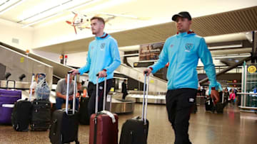 SEATTLE, WA - JULY 2: West Ham United F.C. players Tony Martinez (L) and Sofiane Feghouli arrive at Sea-Tac International Airport July 2, 2016 in Seattle, Washington. West Ham United F.C. is in Seattle to play play a friendly match with the Seattle Sounders July 5, 2016. (Photo by Jeff Vinnick/West Ham United via Getty Images)