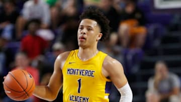 2021 NBA Draft prospect Cade Cunningham brings the ball up the floor. (Photo by Michael Reaves/Getty Images)