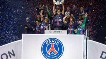 PARIS, FRANCE - MAY 14: Paris Saint-Germain's Swedish forward Zlatan Ibrahimovic holds the trophy on the podium after winning the French L1 title at the end of the French L1 football match between Paris Saint-Germain (PSG) vs Nantes on May 14, 2016 at the Parc des Princes stadium in Paris, France. (Photo by Geoffroy Van der Hasselt/Anadolu Agency/Getty Images)