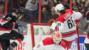 Feb 18, 2016; Ottawa, Ontario, CAN; Ottawa Senators center Zach Smith (15) celebrates after scoring a goal past Carolina Hurricanes goalie Eddie Lack (31) in the second period at the Canadian Tire Centre. Mandatory Credit: Marc DesRosiers-USA TODAY Sports