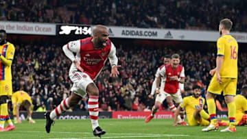 Arsenal's French striker Alexandre Lacazette celebrates scoring his team's second goal during the English Premier League football match between Arsenal and Crystal Palace at the Emirates Stadium in London on October 18, 2021. - - RESTRICTED TO EDITORIAL USE. No use with unauthorized audio, video, data, fixture lists, club/league logos or 'live' services. Online in-match use limited to 120 images. An additional 40 images may be used in extra time. No video emulation. Social media in-match use limited to 120 images. An additional 40 images may be used in extra time. No use in betting publications, games or single club/league/player publications. (Photo by Glyn KIRK / AFP) / RESTRICTED TO EDITORIAL USE. No use with unauthorized audio, video, data, fixture lists, club/league logos or 'live' services. Online in-match use limited to 120 images. An additional 40 images may be used in extra time. No video emulation. Social media in-match use limited to 120 images. An additional 40 images may be used in extra time. No use in betting publications, games or single club/league/player publications. / RESTRICTED TO EDITORIAL USE. No use with unauthorized audio, video, data, fixture lists, club/league logos or 'live' services. Online in-match use limited to 120 images. An additional 40 images may be used in extra time. No video emulation. Social media in-match use limited to 120 images. An additional 40 images may be used in extra time. No use in betting publications, games or single club/league/player publications. (Photo by GLYN KIRK/AFP via Getty Images)