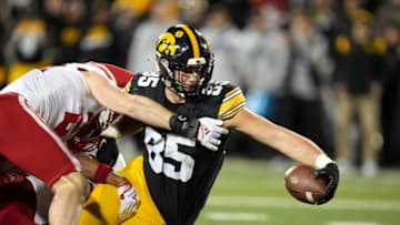 Iowa tight end Luke Lachey reaches the ball into the end zone for a touchdown in the fourth quarter against Nebraska during a NCAA football game on Friday, Nov. 25, 2022, at Kinnick Stadium in Iowa City.Iowavsneb 20221125 Bh