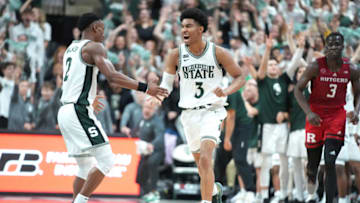 EAST LANSING, MI - JANUARY 19: Jaden Akins #3 of the Michigan State Spartans celebrates a shot with Tyson Walker #2 during a college basketball game against the Rutgers Scarlet Knights at the Breslin Center on January 19, 2023 in East Lansing, Michigan (Photo by Mitchell Layton/Getty Images)
