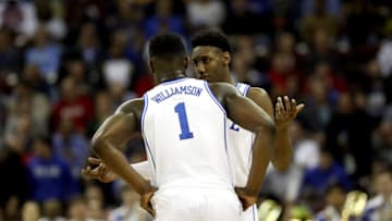 COLUMBIA, SOUTH CAROLINA - MARCH 22: Zion Williamson #1 and RJ Barrett #5 of the Duke Blue Devils speak during a timeout against the North Dakota State Bison in the first half during the first round of the 2019 NCAA Men's Basketball Tournament at Colonial Life Arena on March 22, 2019 in Columbia, South Carolina. (Photo by Streeter Lecka/Getty Images)