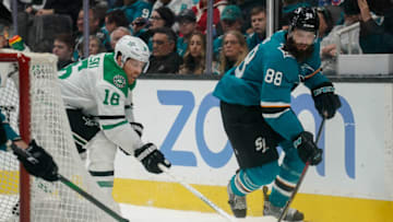 Jan 11, 2020; San Jose, California, USA; Dallas Stars center Joe Pavelski (16) and San Jose Sharks defenseman Brent Burns (88) fight for control of the puck during the third period at SAP Center at San Jose. Mandatory Credit: Stan Szeto-USA TODAY Sports