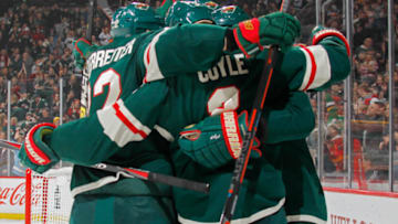 ST. PAUL, MN - DECEMBER 31: Nino Niederreiter #22 of the Minnesota Wild and Charlie Coyle #3 of the Minnesota Wild congratulate Mikko Koivu #9 of the Minnesota Wild on his 1st period goal during a game with the Pittsburgh Penguins at Xcel Energy Center on December 31, 2018 in St. Paul, Minnesota.(Photo by Bruce Kluckhohn/NHLI via Getty Images)