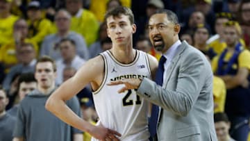 Feb 16, 2020; Ann Arbor, Michigan, USA; Michigan Wolverines head coach Juwan Howard talks to guard Franz Wagner (21) during the second half against the Indiana Hoosiers at Crisler Center. Mandatory Credit: Rick Osentoski-USA TODAY Sports