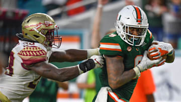MIAMI, FL - OCTOBER 06: Brevin Jordan #9 of the Miami Hurricanes scores a touchdown in the second half against the Florida State Seminoles at Hard Rock Stadium on October 6, 2018 in Miami, Florida. (Photo by Mark Brown/Getty Images)
