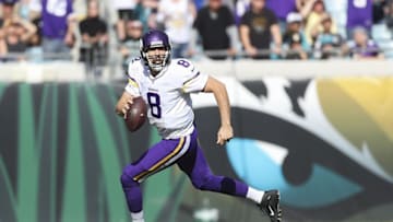 Dec 11, 2016; Jacksonville, FL, USA; Minnesota Vikings quarterback Sam Bradford (8) rolls out of the pocket in the second quarter against the Jacksonville Jaguars at EverBank Field. Mandatory Credit: Logan Bowles-USA TODAY Sports