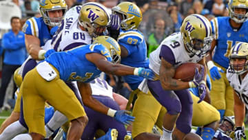 PASADENA, CA - OCTOBER 06: Defensive back Quentin Lake #37 of the UCLA Bruins can't stop running back Myles Gaskin #9 of the Washington Huskiesas he runs into the end zone for a touchdown in the second quarter of the game at the Rose Bowl on October 6, 2018 in Pasadena, California. (Photo by Jayne Kamin-Oncea/Getty Images)