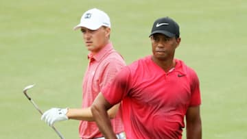 PONTE VEDRA BEACH, FL - MAY 13: Tiger Woods of the United States and Jordan Spieth of the United States look on from the fourth hole during the final round of THE PLAYERS Championship on the Stadium Course at TPC Sawgrass on May 13, 2018 in Ponte Vedra Beach, Florida. (Photo by Jamie Squire/Getty Images)