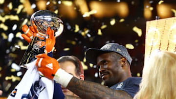 Feb 7, 2016; Santa Clara, CA, USA; Denver Broncos linebacker Von Miller (58) celebrates with the Vince Lombardi Trophy after defeating the Carolina Panthers in Super Bowl 50 at Levi
