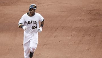 Jun 29, 2014; Pittsburgh, PA, USA; Pittsburgh Pirates third baseman Pedro Alvarez (24) rounds the bases after hitting a two run home run against the New York Mets during the fourth inning at PNC Park. The Pirates won 5-2. Mandatory Credit: Charles LeClaire-USA TODAY Sports