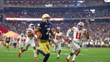 Jan 1, 2016; Glendale, AZ, USA; Notre Dame Fighting Irish wide receiver Will Fuller (7) runs for a touchdown against the Ohio State Buckeyes during the 2016 Fiesta Bowl at University of Phoenix Stadium. The Buckeyes defeated the Fighting Irish 44-28. Mandatory Credit: Mark J. Rebilas-USA TODAY Sports