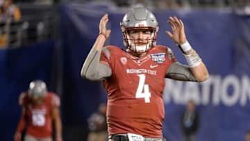 Dec 27, 2016; San Diego , CA, USA; Washington State Cougars quarterback Luke Falk (4) reacts late in the second half against the Minnesota Golden Gophers at Qualcomm Stadium. Minnesota won 17-12. Mandatory Credit: Orlando Ramirez-USA TODAY Sports