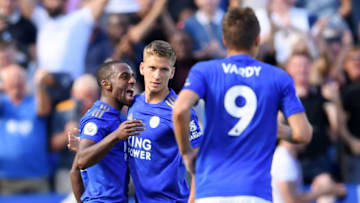 LEICESTER, ENGLAND - SEPTEMBER 21: Ricardo Pereira of Leicester City (L) celebrates after scoring his team's first goal with team mate Dennis Praet during the Premier League match between Leicester City and Tottenham Hotspur at The King Power Stadium on September 21, 2019 in Leicester, United Kingdom. (Photo by Laurence Griffiths/Getty Images)