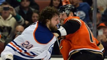 Nov 11, 2015; Anaheim, CA, USA; Anaheim Ducks left wing Patrick Maroon (19) and Edmonton Oilers left wing Luke Gazdic (20) fight in the second period at Honda Center. Mandatory Credit: Kirby Lee-USA TODAY Sports