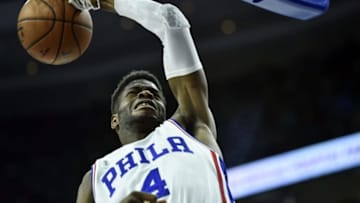Apr 10, 2016; Philadelphia, PA, USA; Philadelphia 76ers forward Nerlens Noel (4) dunks during the third quarter of the game against the Milwaukee Bucks at the Wells Fargo Center. The Milwaukee Bucks won 109-108 in OT. Mandatory Credit: John Geliebter-USA TODAY Sports