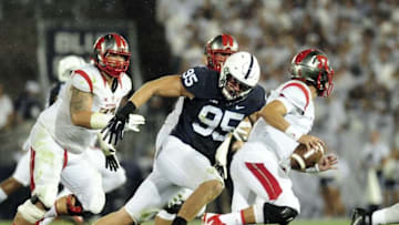 Sep 19, 2015; University Park, PA, USA; Rutgers Scarlet Knights quarterback Chris Laviano (5) is pressured by Penn State Nittany Lions defensive end Carl Nassib (95) in the second quarter at Beaver Stadium. Mandatory Credit: Evan Habeeb-USA TODAY Sports