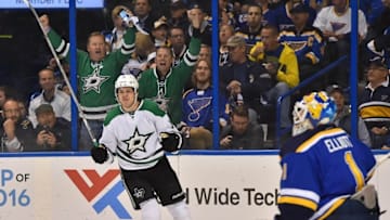 May 9, 2016; St. Louis, MO, USA; Dallas Stars center Mattias Janmark (13) celebrates after scoring a goal past St. Louis Blues goalie Brian Elliott (1) during there first period in game six of the second round of the 2016 Stanley Cup Playoffs at Scottrade Center. Mandatory Credit: Jasen Vinlove-USA TODAY Sports
