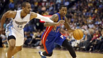 Oct 29, 2014; Denver, CO, USA; Detroit Pistons guard Kentavious Caldwell-Pope (5) drives to the basket against Denver Nuggets guard Arron Afflalo (10) during the second half at Pepsi Center. The Nuggets won 89-79. Mandatory Credit: Chris Humphreys-USA TODAY Sports